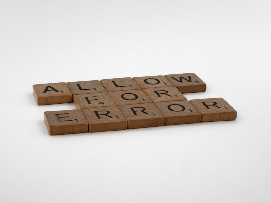 The image displays a set of wooden Scrabble tiles spelling the words 'ALLOW,' 'FLOUR,' and 'ERROR' arranged on a plain white surface. The tiles are positioned in three rows, with 'ALLOW' at the top, 'FLOUR' in the middle, and 'ERROR' at the bottom, all aligned horizontally. The background is clear and uncluttered, highlighting the natural wood texture and black letter print of each tile. This visual can be associated with the themes of delays, mistakes, or unexpected issues related to house removals or moving logistics. The arrangement subtly reflects the importance of careful planning and swift action in home relocation or furniture transport projects, aligning with services provided by [COMPANY_NAME], such as same day removals in Lambeth when delays threaten your move. The eco-friendly appearance of the tiles and the clean setting evoke professionalism and attention to detail, essential qualities in the removals industry.